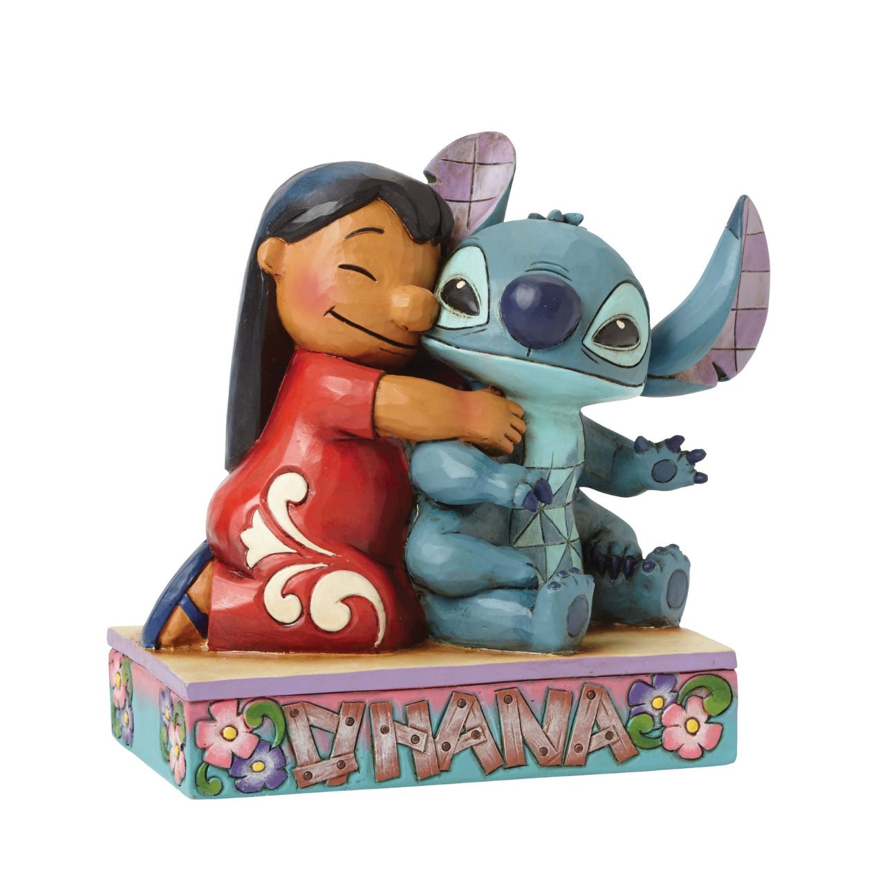 Jim Shore Ohana Means Family Lilo and Stitch Figurine  Lilo and Stitch come together in an exemplary display of Ohana which means family. This heart-warming piece has been designed by award winning artist and sculptor, Jim Shore for the Disney Traditions range.