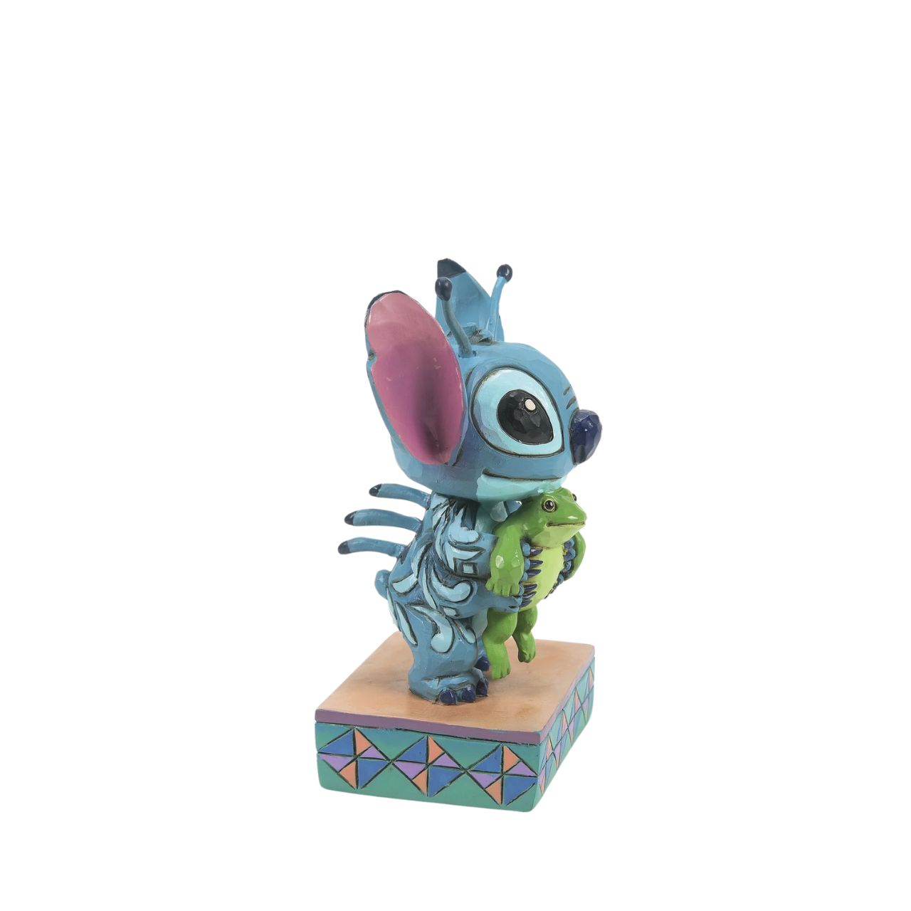 Almost too cute to handle, this handcrafted design shows Stitch holding Frog just moments after he saved the little guy's life. The colourful sculpture is crafted from high-quality cast stone and hand-painted for a beautiful, one-of-a-kind finish.