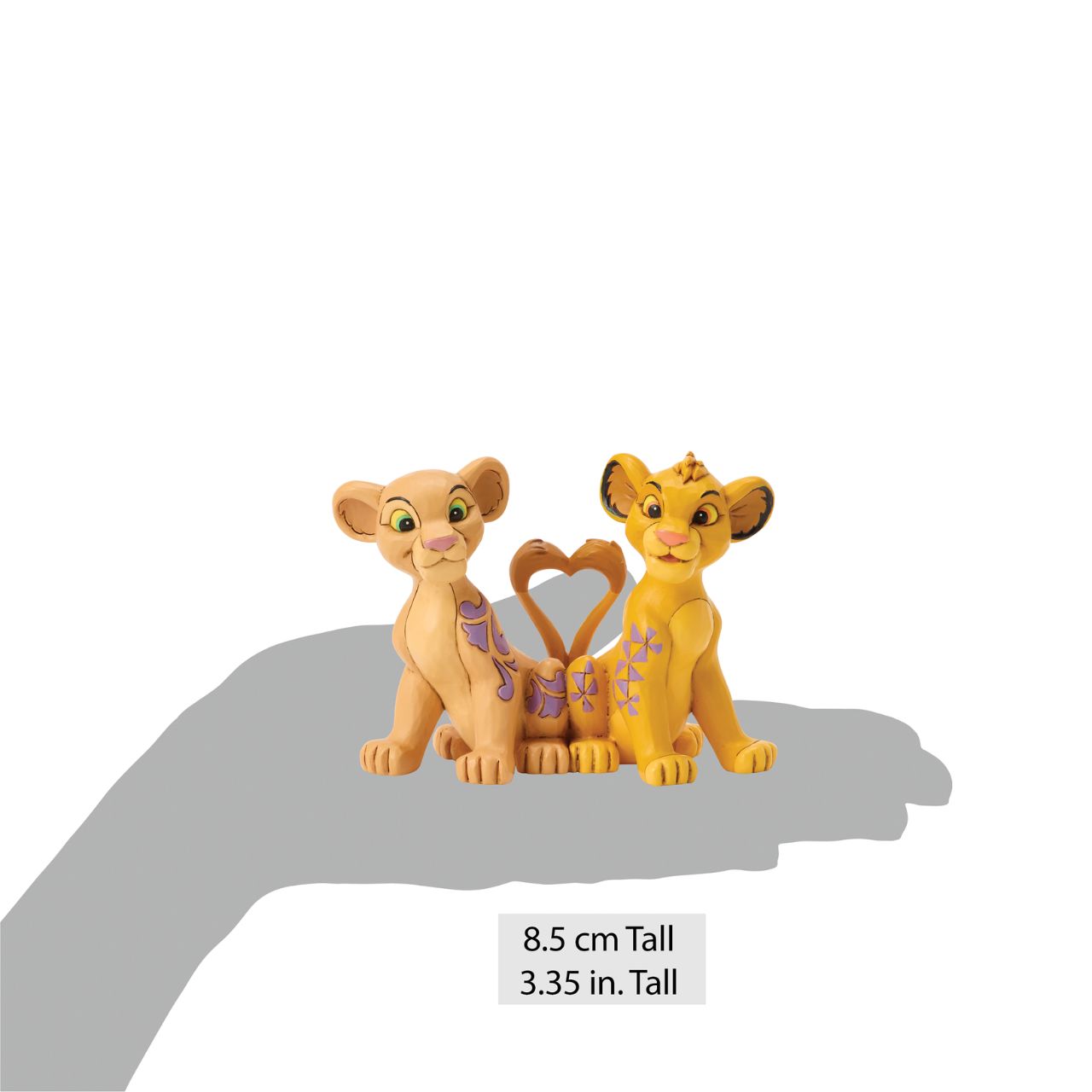 Celebrate the circle of love with Simba and Nala from Disney's Lion King, with this charming Jim Shore design featuring the young pair. Their tails form a heart as they sit close, adorned with Jim Shore's signature rosemaling and floral flourishes.