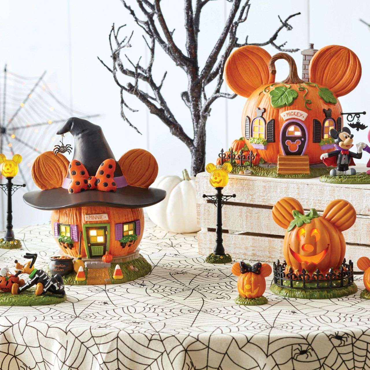 This large lit pumpkin is the perfect center to your Disney Village display. The jack-o-lantern's smiling face welcomes all to the fall festivities.