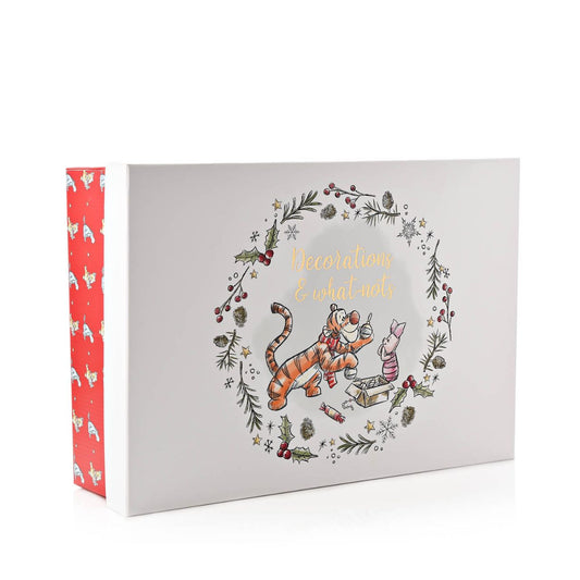 Disney Winnie Christmas Storage Box  Store your favourite decorations in this delightful Winnie the Pooh storage box. With adorable illustrations, this is a great place to keep things safe over the Christmas season.
