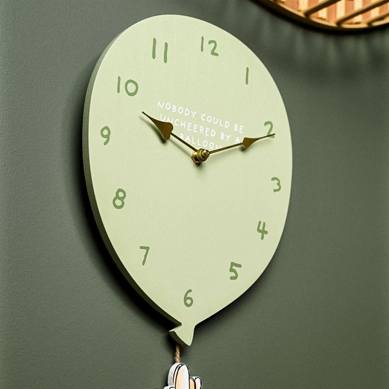 Add a touch of whimsy to your walls with this delightful Disney Winnie The Pooh Balloon Wall Clock from DISNEY.