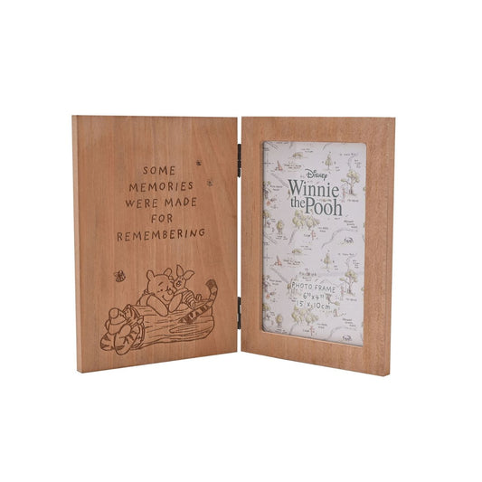 Featuring a charming engraved message and an adorable image of Pooh and friends. This wooden frame is a perfect gift to celebrate cherished memories with loved ones.