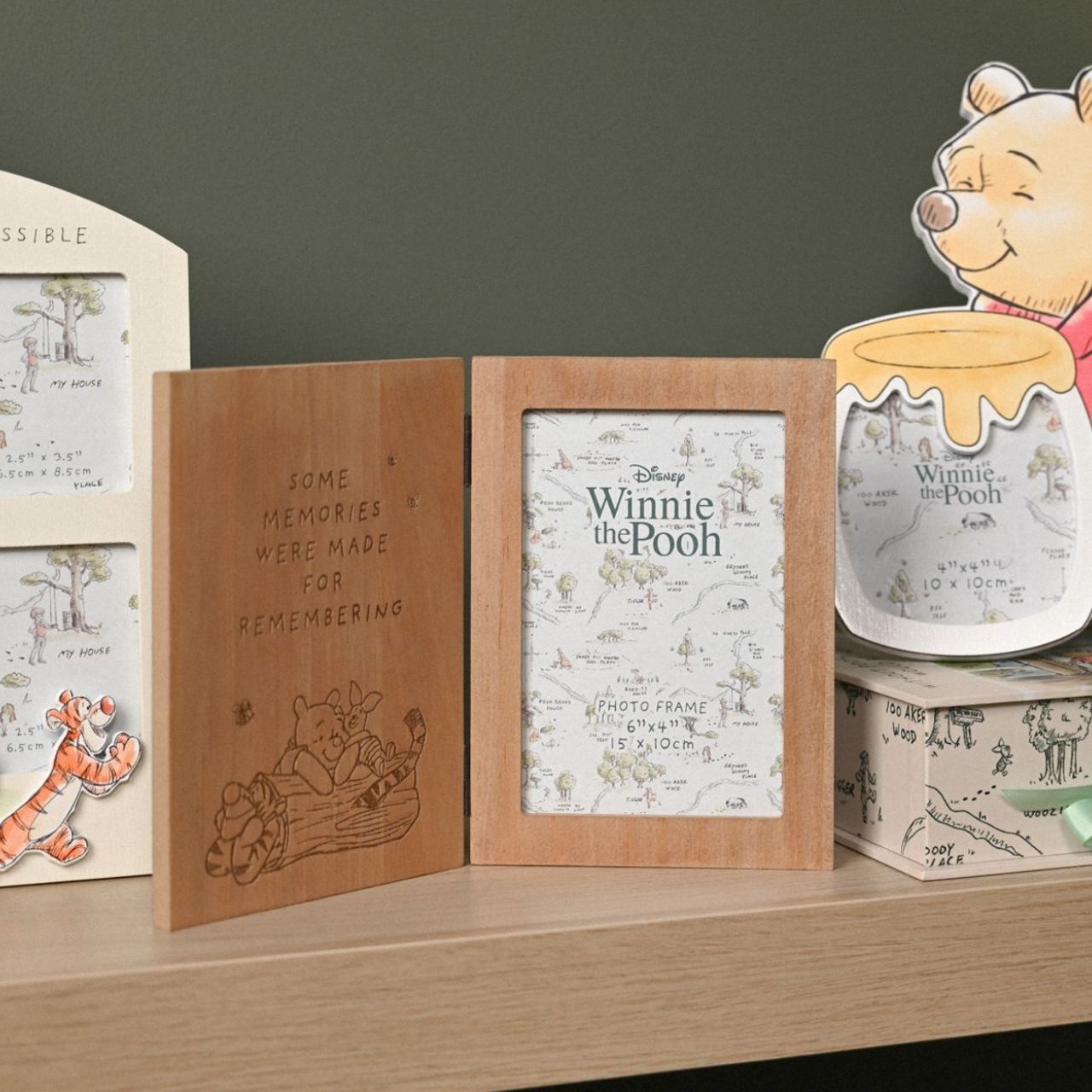 Featuring a charming engraved message and an adorable image of Pooh and friends. This wooden frame is a perfect gift to celebrate cherished memories with loved ones.