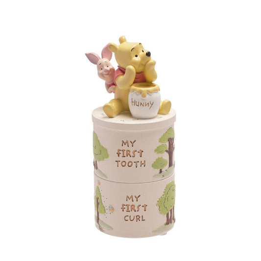 Winnie The Pooh Resin Tooth And Curl Trinket Box Set  A Winnie the Pooh tooth and curl trinket box set from DISNEY.  This loveable set from Magical Beginnings creates a beloved keepsake with an extra sprinkling of timeless Disney magic.