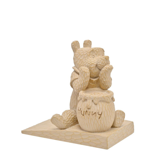 Winnie the Pooh Wood Effect Door Stop  A delightful Winnie-the-Pooh door stop from DISNEY.  Based on the works of A.A.Milne and E.H.Shepard, the charming personality of Winnie is readily on display for all to enjoy.