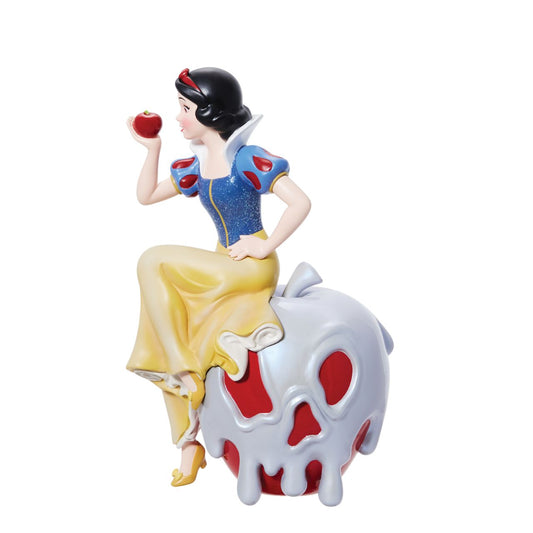 Disney Showcase 100 Years of Wonder Snow White Apple Figurine  Celebrate the Walt Disney Company's 100th anniversary with our new Disney 100 Snow White figurine from Disney showcase collection. Snow White sits atop the poisoned apple and holds a bright red apple in her slender hand.