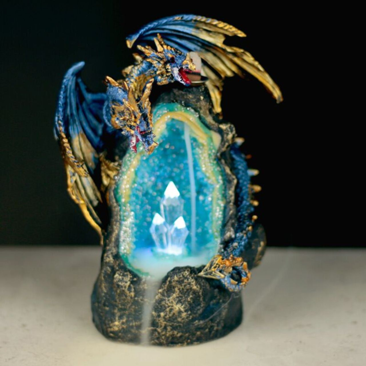 Elevate your meditation or relaxation space with the Dragon with Crystal Cave LED Backflow Incense Burner.