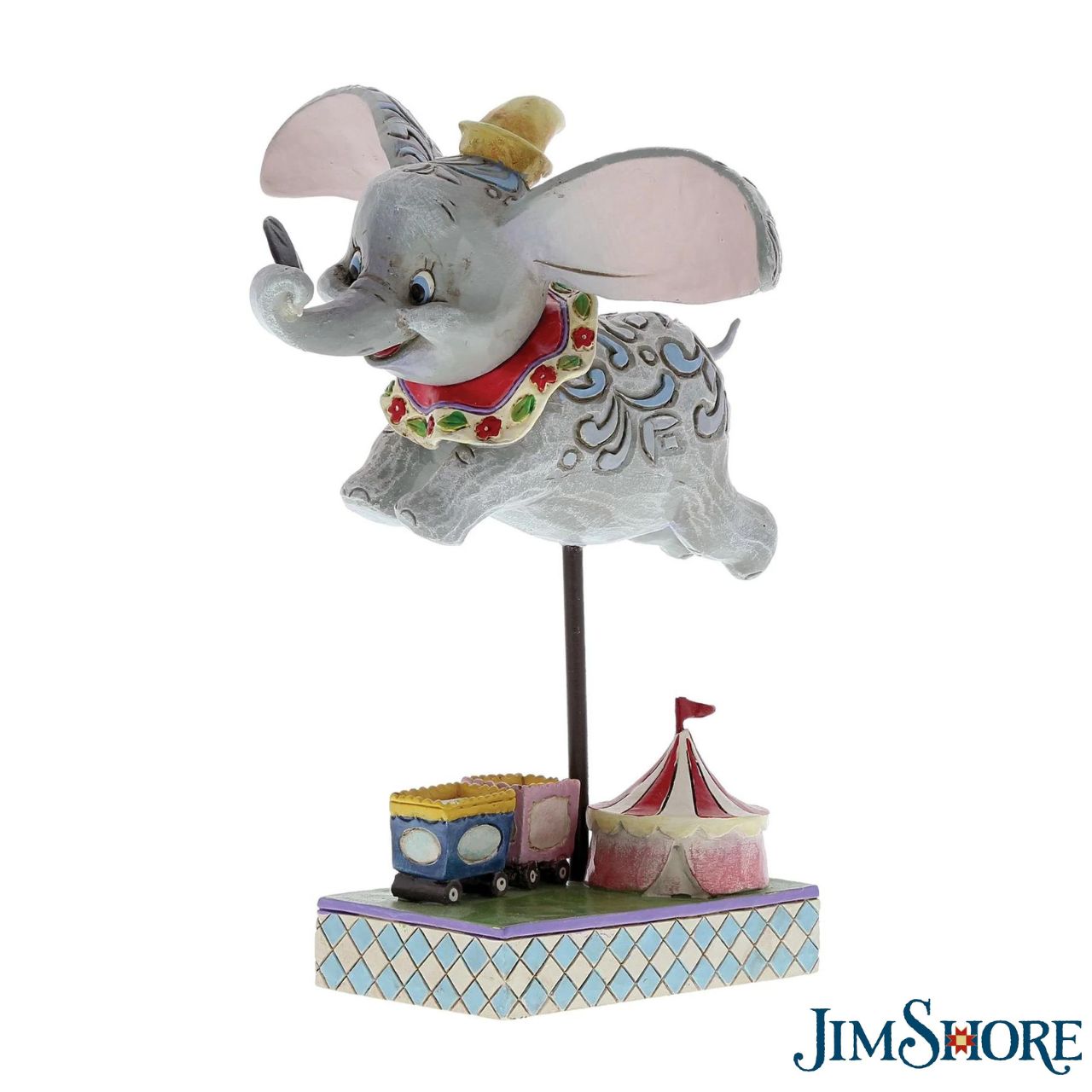 Jim Shore Dumbo Faith in Flight Figurine  Faith in Flight (Dumbo Figurine)  Disney Traditions combines the magic of Disney with the American folk artistry of Jim Shore. Enjoy this wonderful figurine of beloved Dumbo as he takes his first flight with the help of a magical feather.