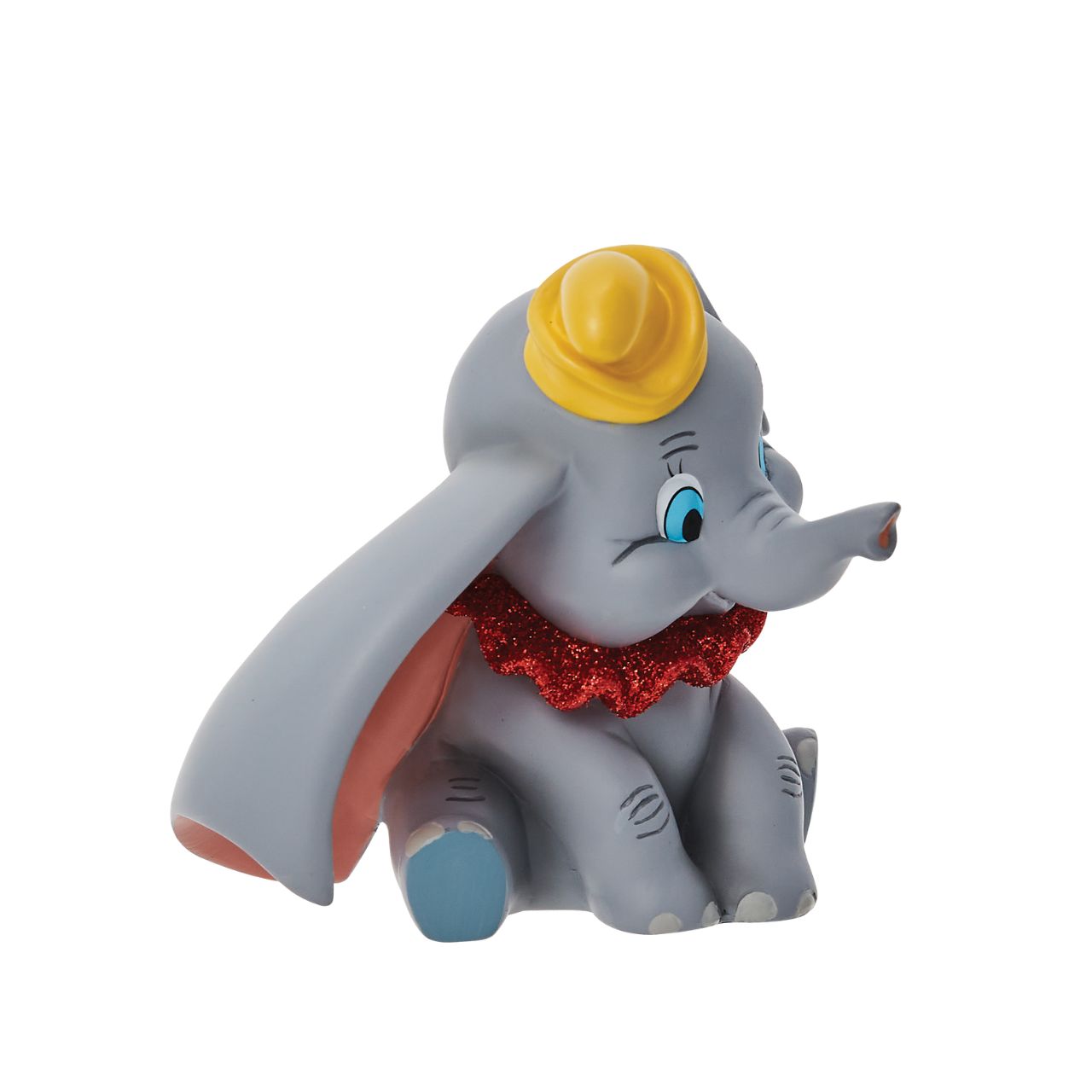 Everyone's favourite flying elephant looks circus-ready in this adorable pose by Disney Showcase. This realistic figurine has a beautiful finish complete with red glitter. This is a great addition to any nursery and is not a toy or children's product.