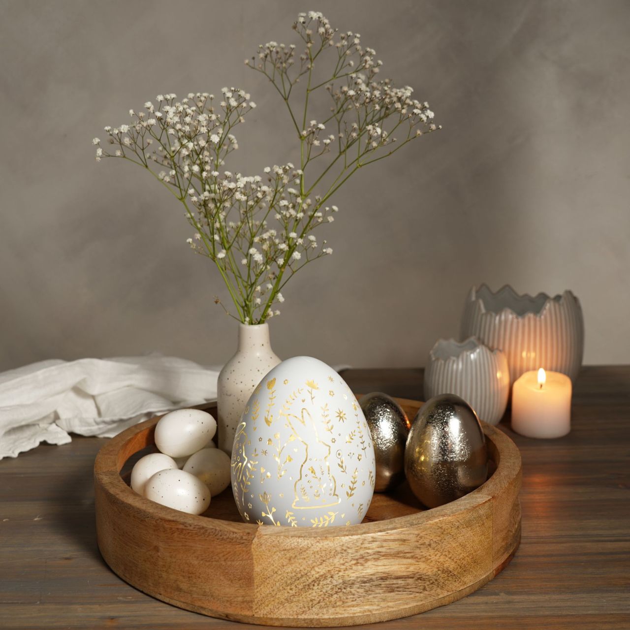 Add a touch of Easter charm to your décor with this LED battery-operated light. Shaped like an egg and adorned with a playful bunny design, this light illuminates to project a delightful springtime pattern