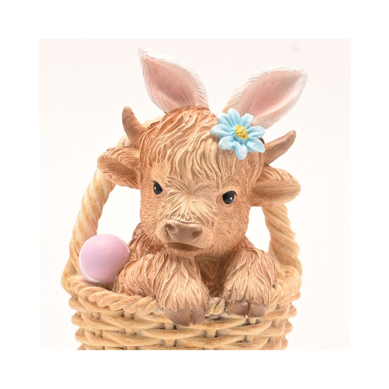 The Highland Cow In Basket Figurine from The Eggs-traordinary Gifting Co taps into the continuing trend for Highland cow décor.