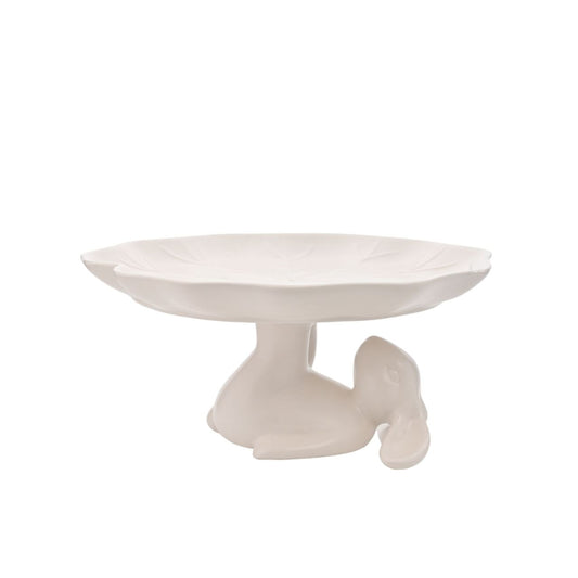 This delightful bunny cake stand features a playful design, perfect for displaying cakes and pastries.