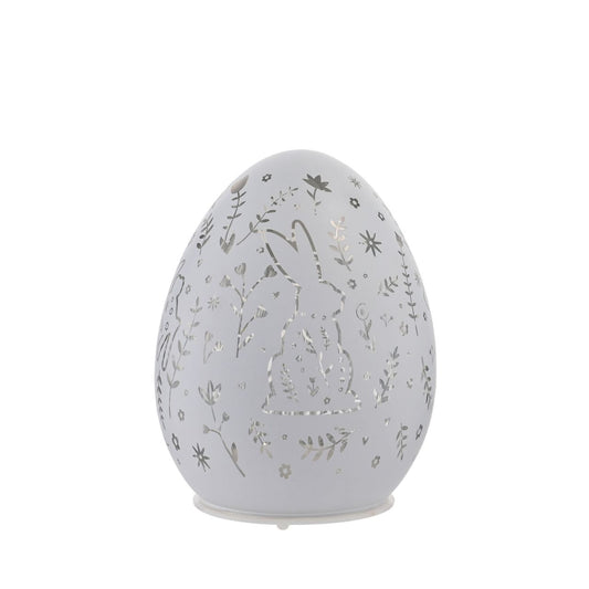 Add a touch of Easter charm to your décor with this LED battery-operated light. Shaped like an egg and adorned with a playful bunny design, this light illuminates to project a delightful springtime pattern