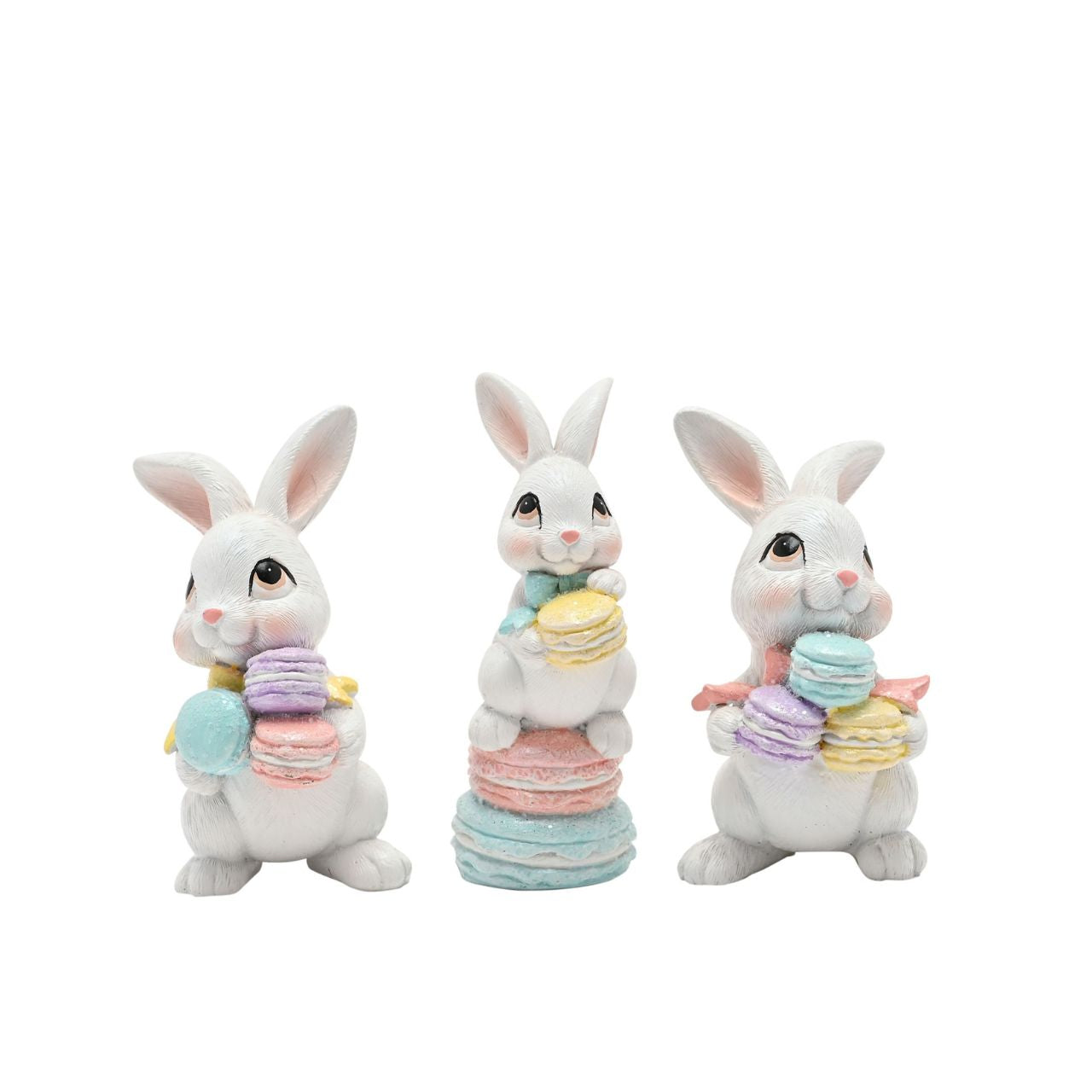 The Eggs-traordinary Gifting Co Bunny with Macarons Figurines features a playful bunny figurines each one holding a stack of pastel macarons.