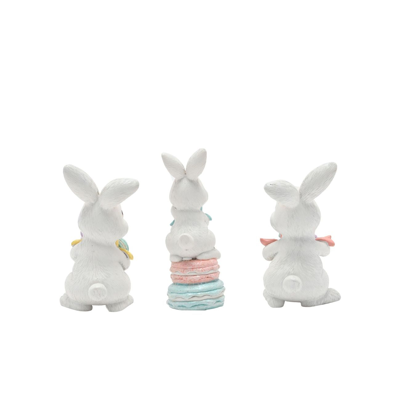 The Eggs-traordinary Gifting Co Bunny with Macarons Figurines features a playful bunny figurines each one holding a stack of pastel macarons.