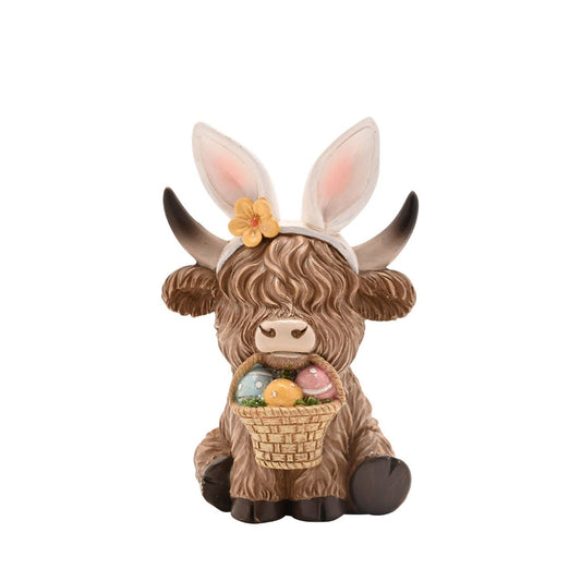 This Eggs-traordinary Gifting Company Highland Cow With Easter Basket figurine brings playful shelf presence to Easter gifting.