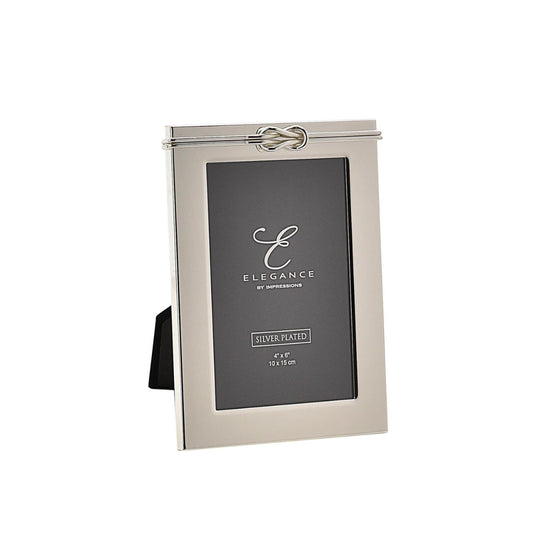 This delightful frame is a true statement piece in which to present treasured photographs at home.