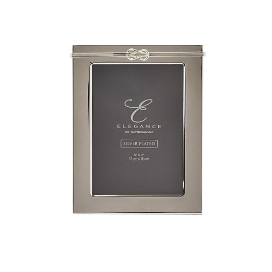 This delightful frame is a true statement piece in which to present treasured photographs at home.