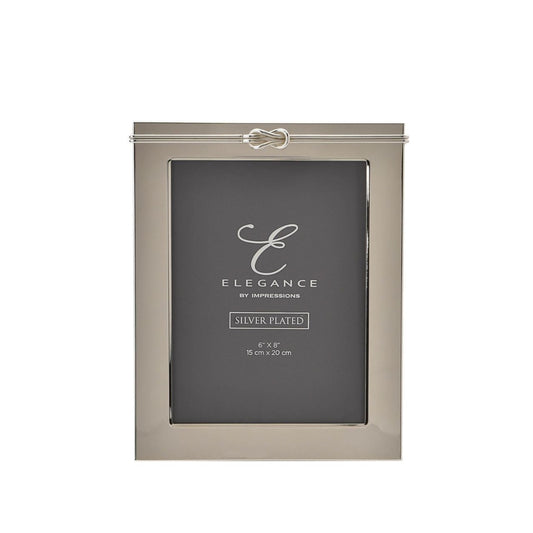 This delightful frame is a true statement piece in which to present treasured photographs at home.