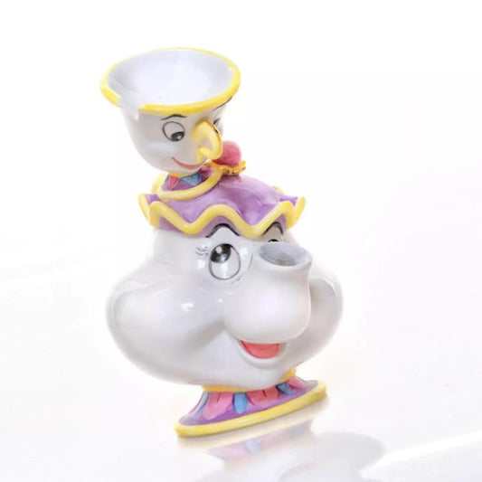 Mrs Potts & Chip figurine from Disney’s Beauty and the Beast  Mrs Potts and Chip are two of the most loved characters from the classic Disney animated film, Beauty and the Beast and we are delighted to add them to our collection. Hand-made and hand decorated, this pair will bring a smile to any face and show the special bond between Chip and his mum.