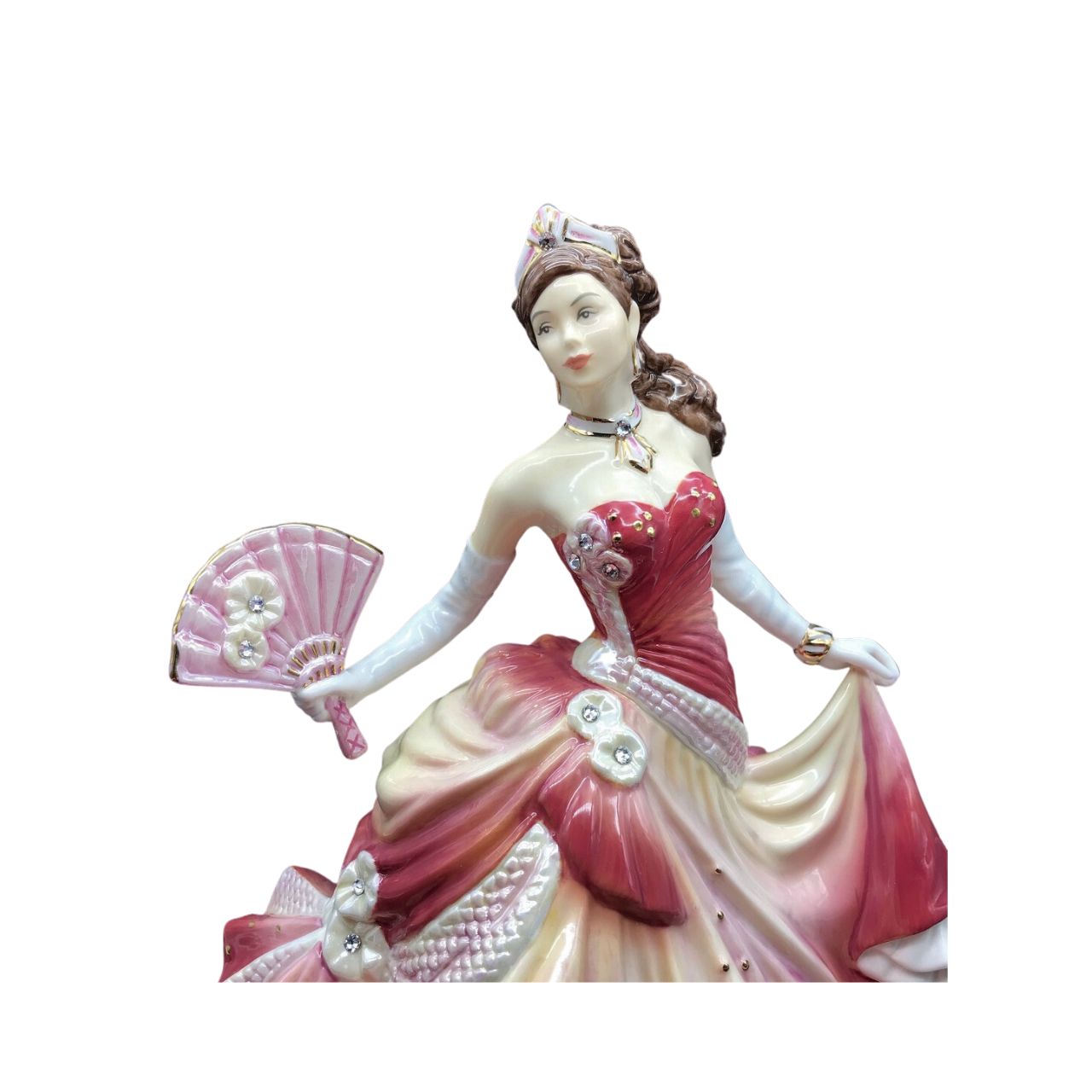English Ladies Company Sunset Romance  Master Painter, Dan Smith felt that Valerie Annand’s stunning model of Midnight Romance was too good not to decorate again and again and again! He chose stunning reds and orange for this version, which makes a beautiful companion for the deep pink, Sweet Romance, figurine.
