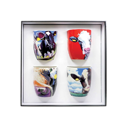 Set of Four Mugs with six different images of the iconic Eoin O'Connor Cow designs. Set of Four 12 Oz Mugs made of New Bone China. With curved handle to ensure you do not scald your fingers and presented in a gift box.