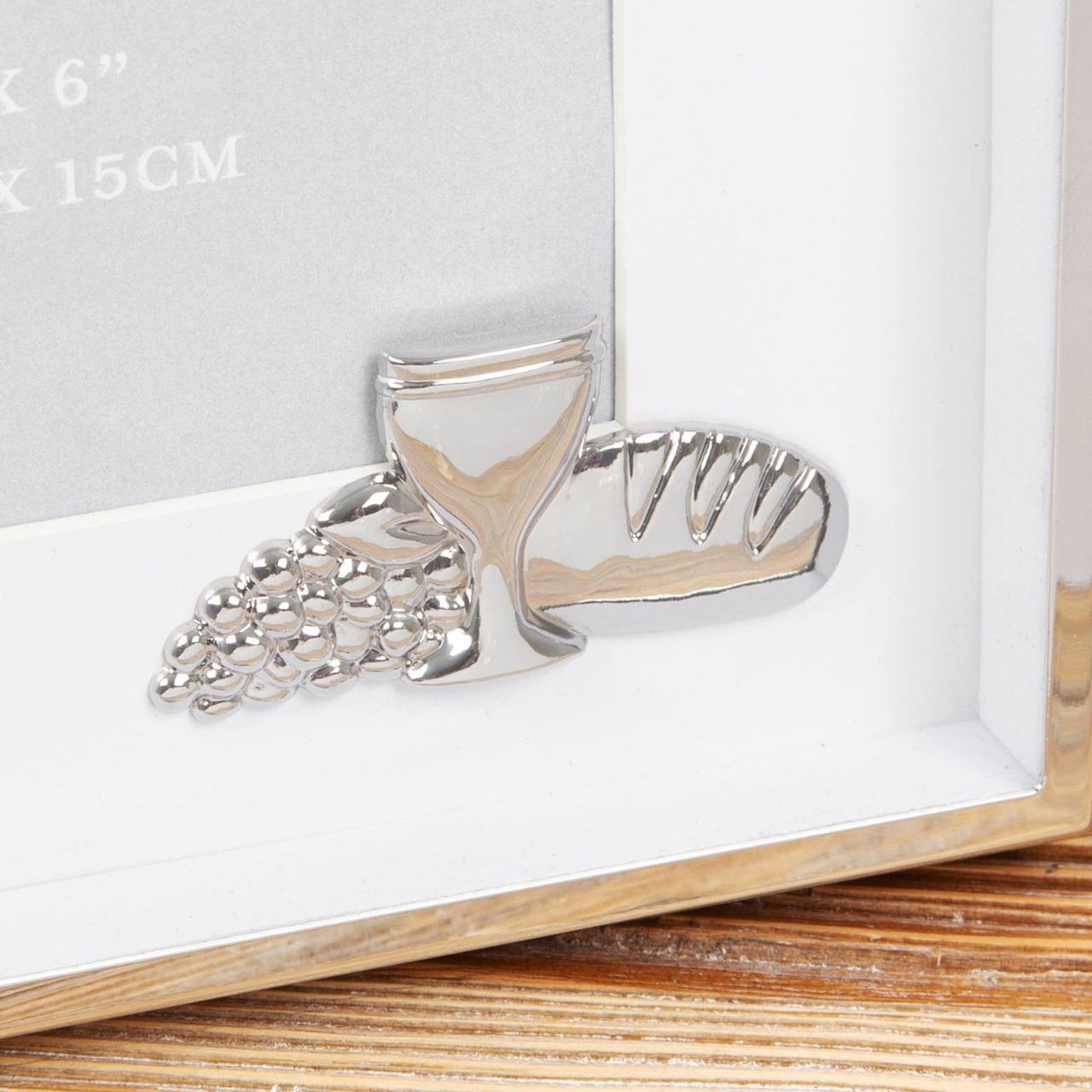 Communion Photo Frame 4" x 6" Faith & Hope  Keep a precious keepsake from their FIRST COMMUNION with this silver plated box photo frame.