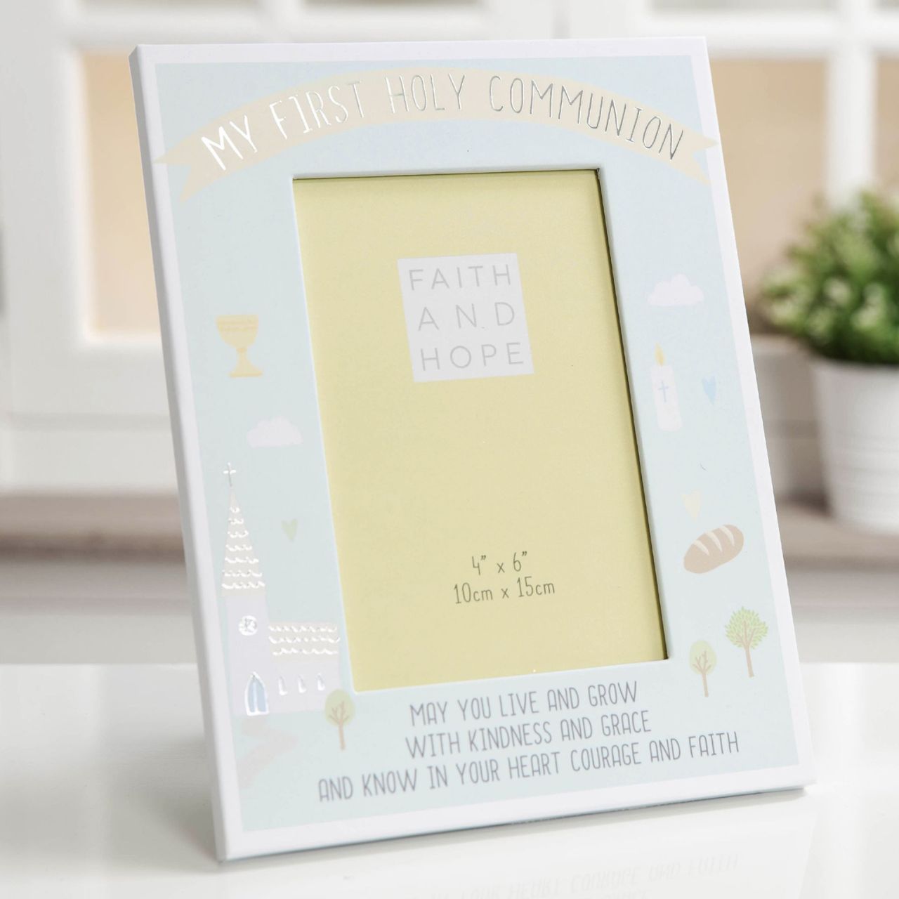 Preserve a precious memory from their FIRST HOLY COMMUNION with this adorable paper wrapped photo frame.