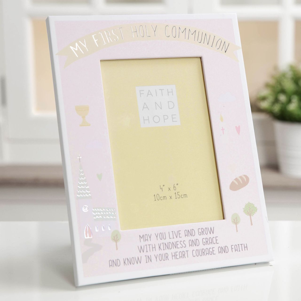 Preserve a precious memory from their FIRST HOLY COMMUNION with this adorable paper wrapped photo frame.