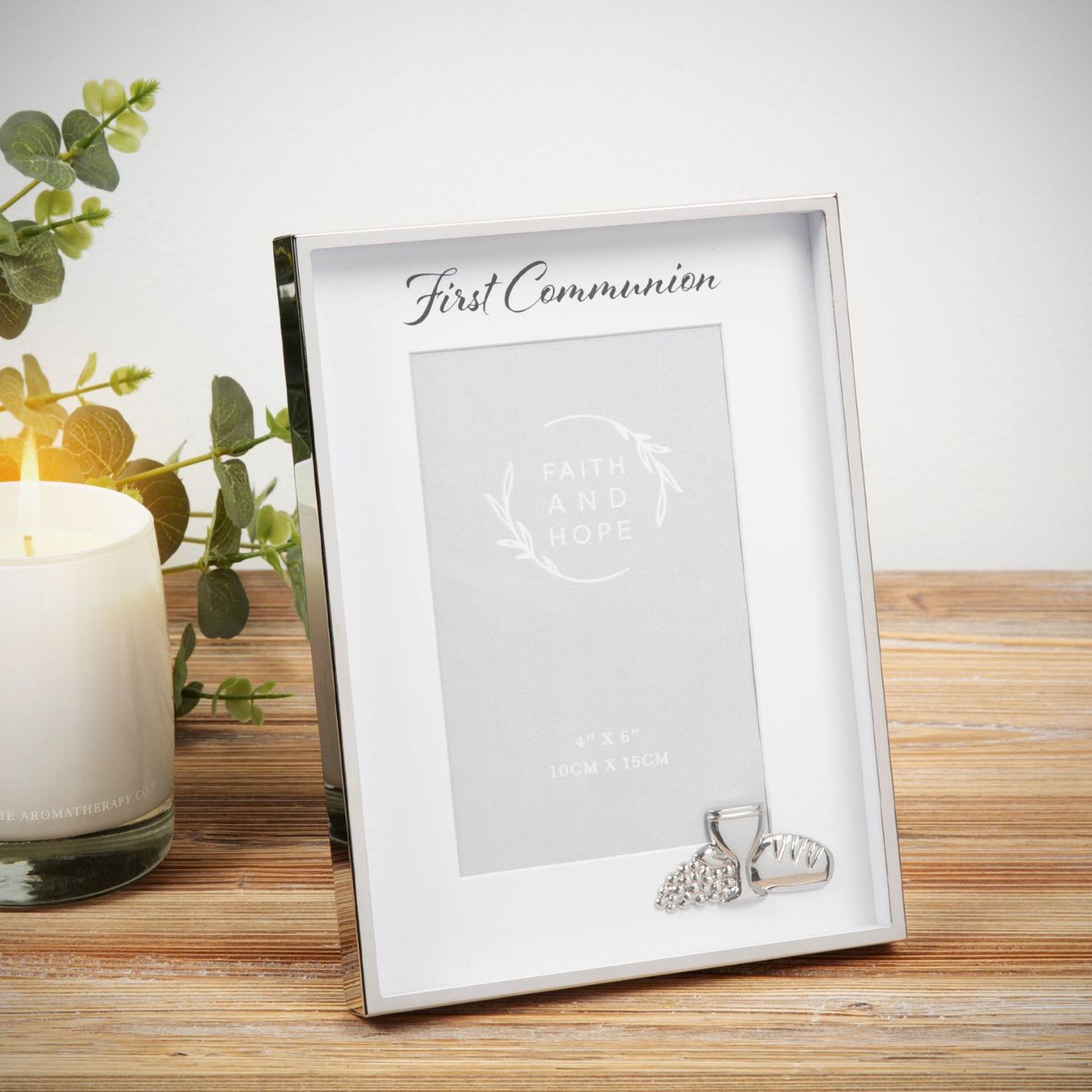 Communion Photo Frame 4" x 6" Faith & Hope  Keep a precious keepsake from their FIRST COMMUNION with this silver plated box photo frame.