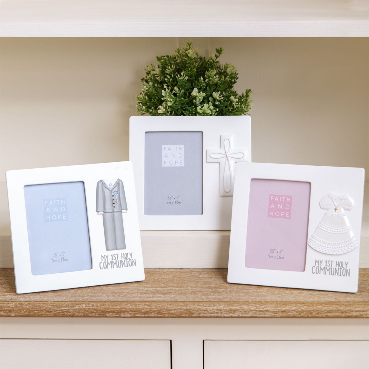 Faith & Hope White Resin Cross Frame 3.5" x 5"  Preserve a precious memory from a special religious occasion with this beautiful moulded white crucifix photo frame.
