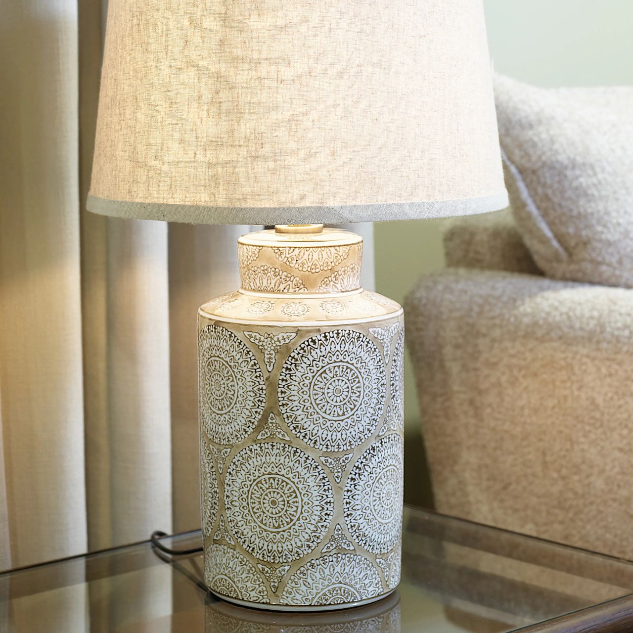 Introducing the Farhan Lamp, a sophisticated addition to any space. The unique design features a beige shade, providing a warm and inviting ambiance. Crafted with expert precision, this lamp adds a touch of elegance to your home décor.