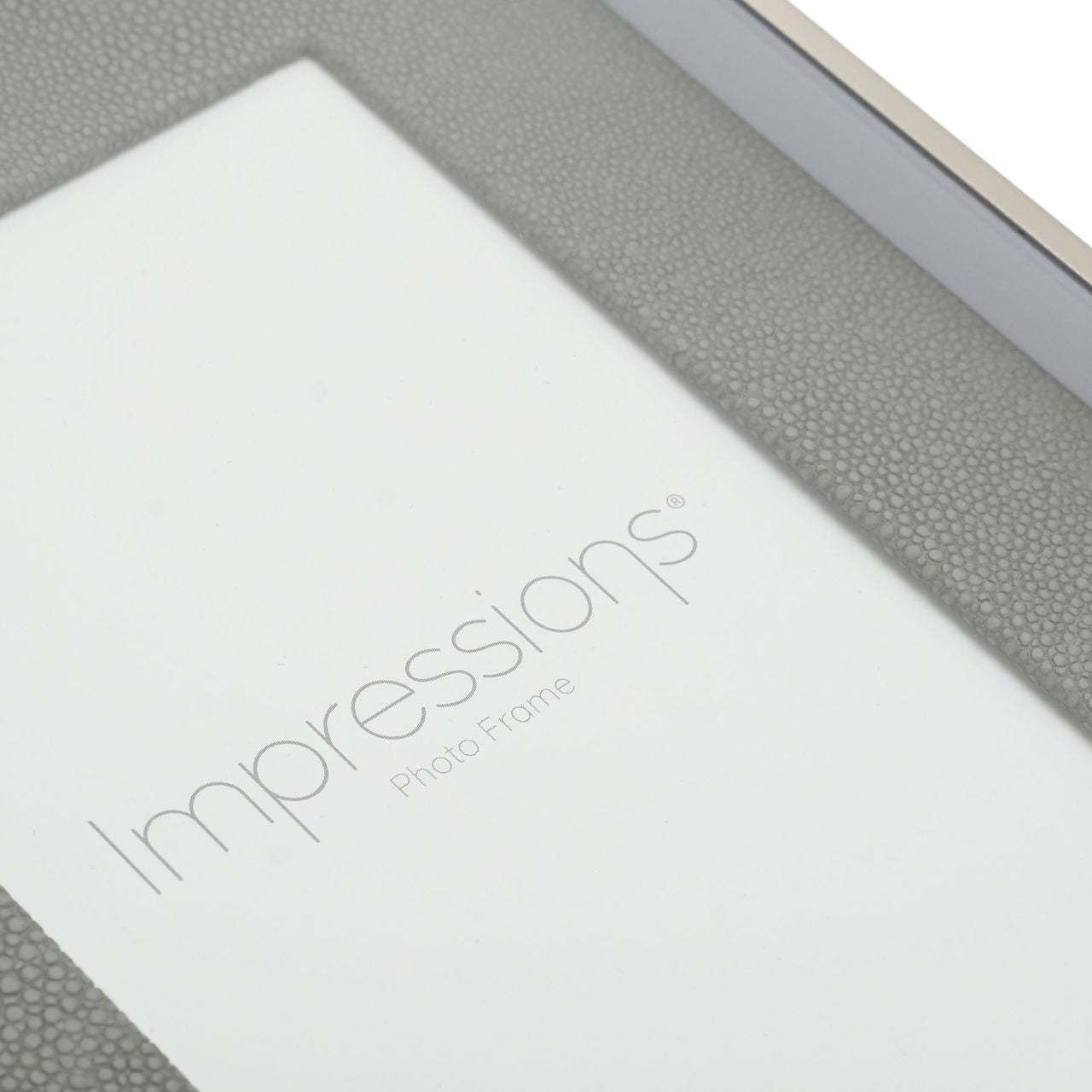Faux Croc Detail Frame Soft Grey 5" x 7"  A silver & soft grey faux croc photo frame.  This stylish frame offers a unique twist on the conventional that would complement both traditional and modern home decors.
