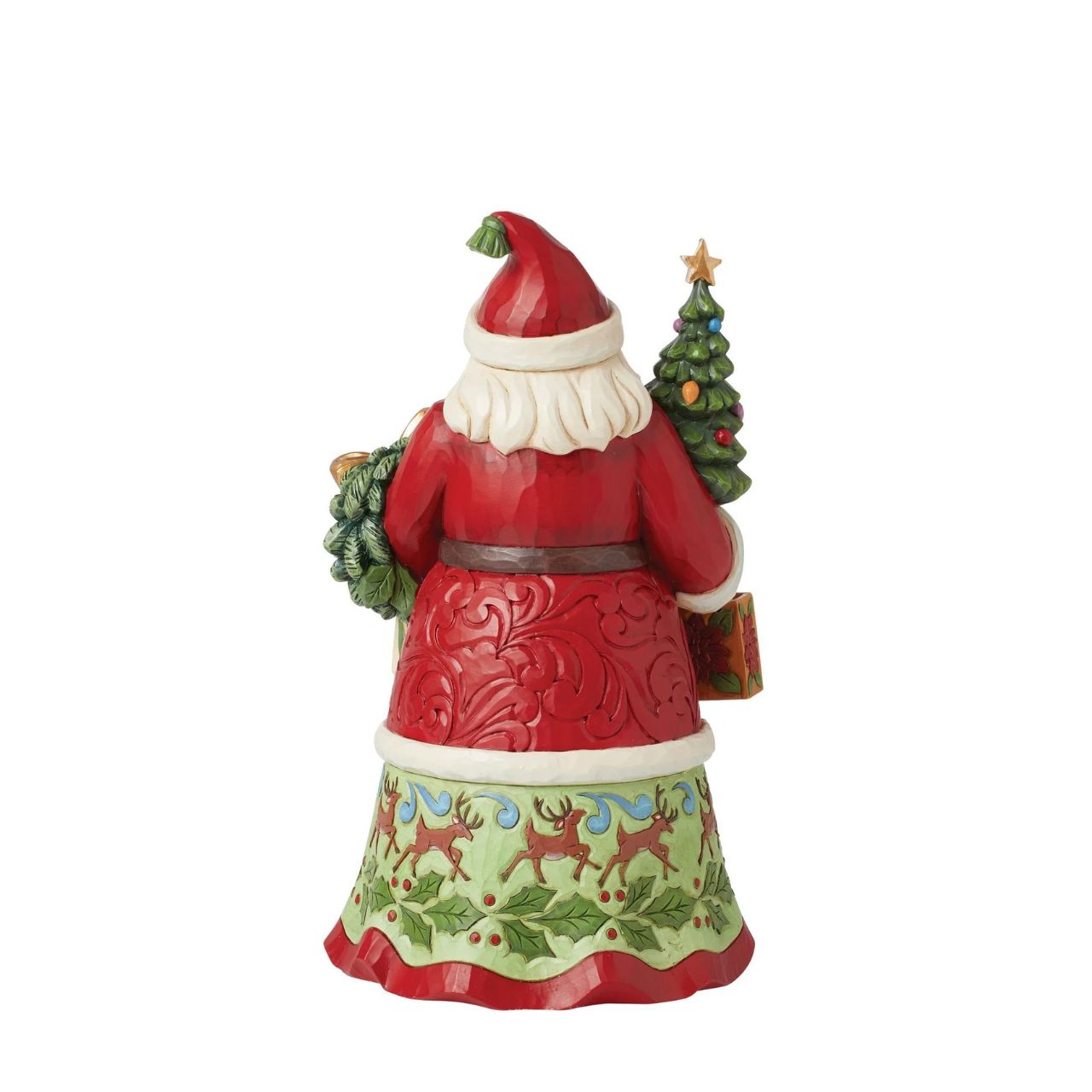 First Edition Signed Figurine - Limited Quantity. Santa is ready to deliver this Christmas. Hand painted, this figurine features Santa with arms full of gifts and is the perfect addition to any festive display.