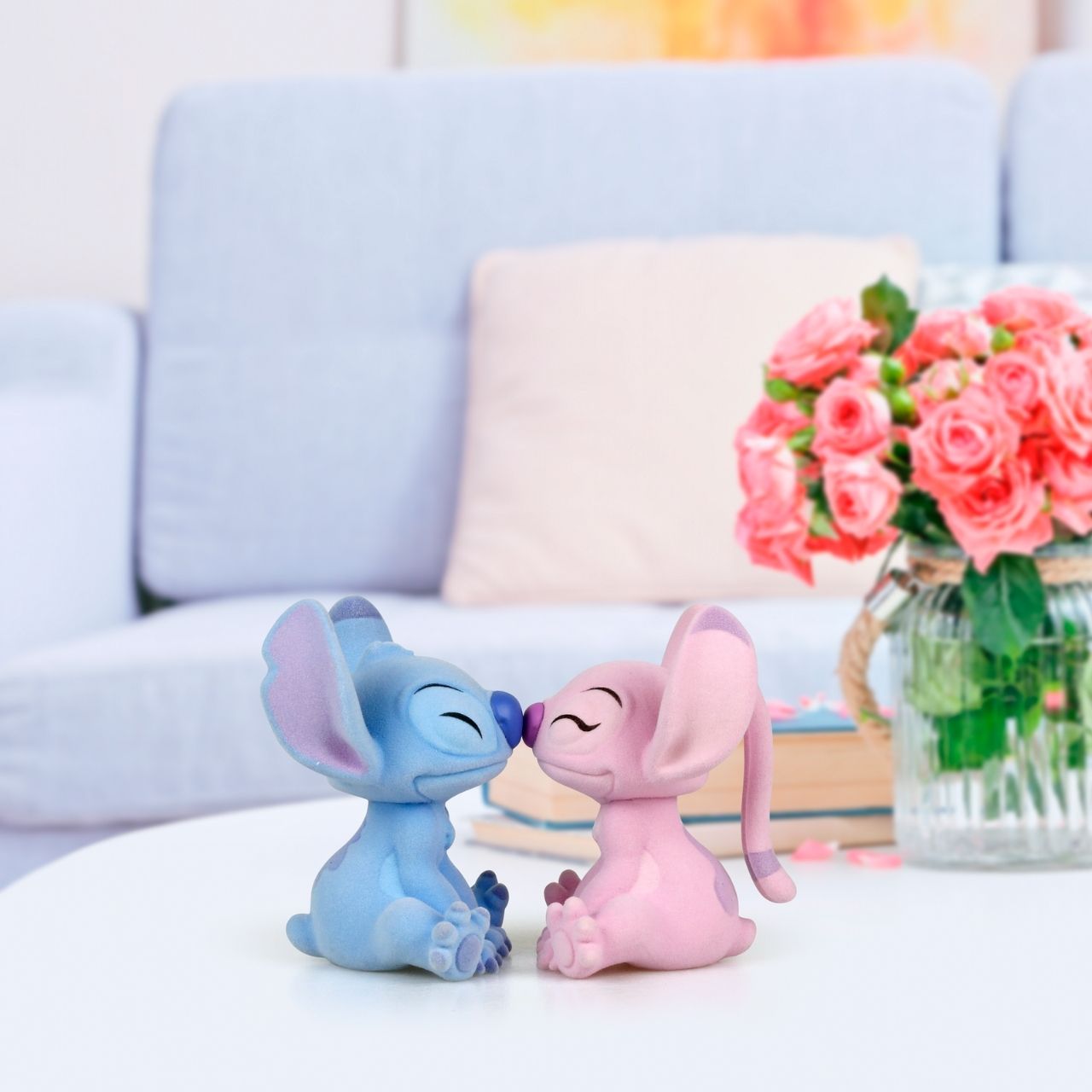 This dynamic duo are together again in this super cute flocked figurine pair. With magnets in their noses to pull them together, they look like they are having a sweet eskimo kiss.
