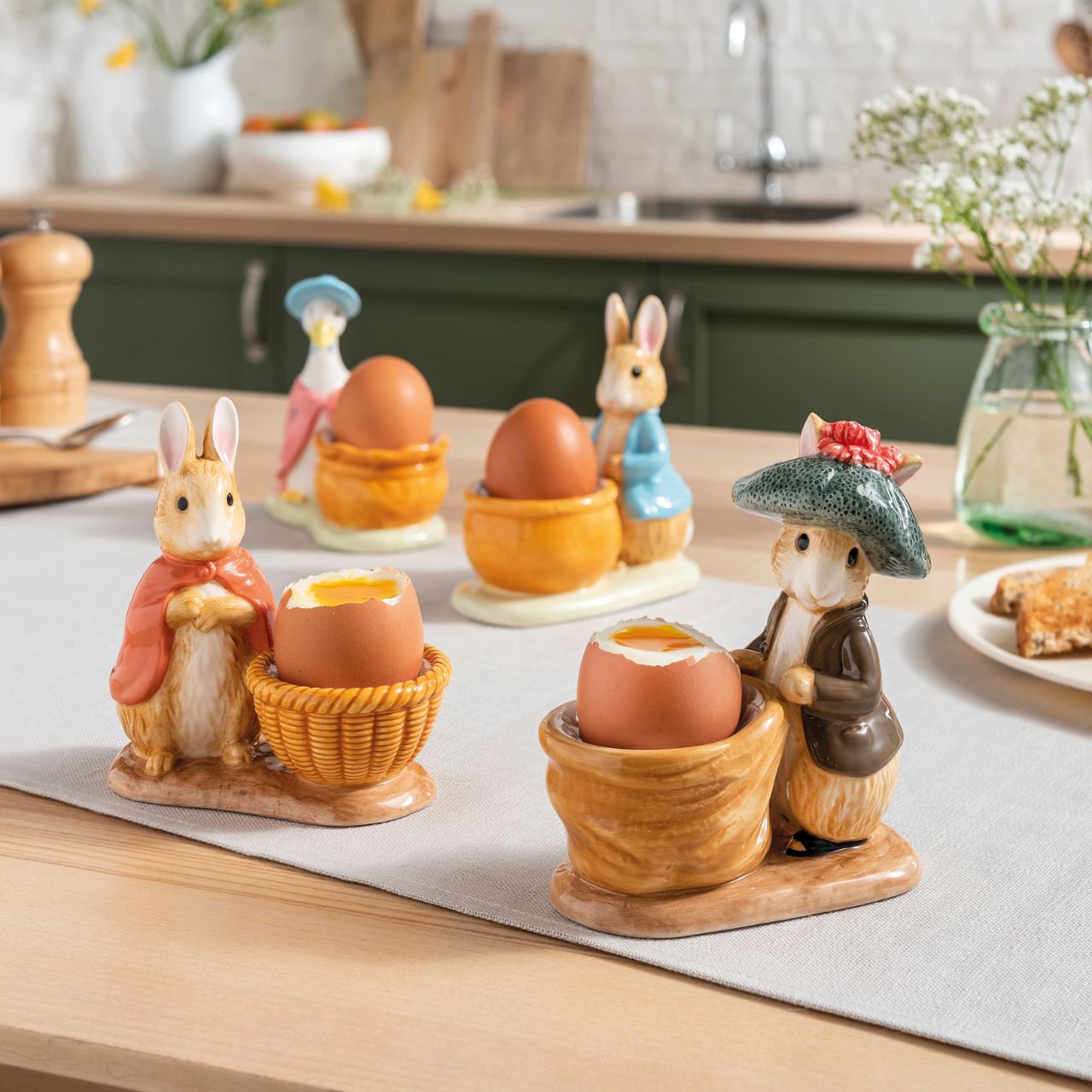 Peter Rabbit Flopsy Egg Cup  Serve your morning eggs in style with our unique and charming Flopsy egg cup, because regular egg cups aren't all they're cracked up to be... This beautiful Beatrix Potter egg cup has been made from sturdy ceramic and makes the ideal. collector's piece or gift. We recommend you use large eggs to feel the true benefit, or why not fill with mini chocolate eggs for a sweet easter gift.