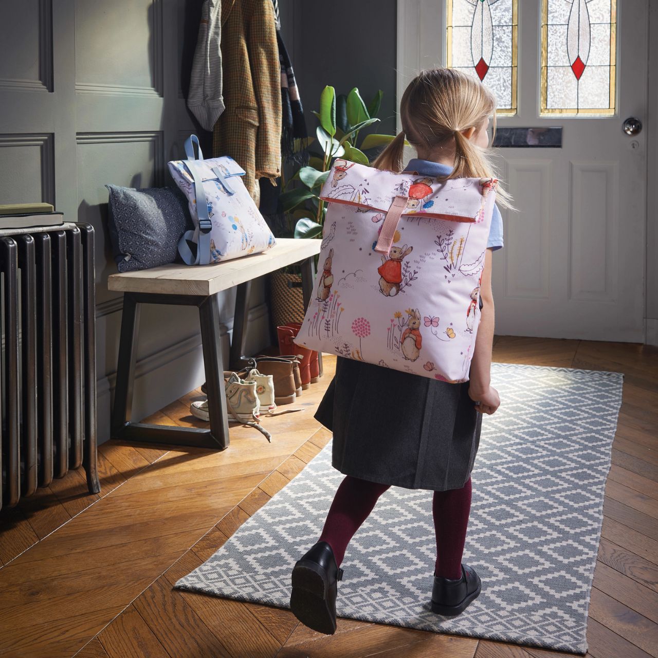 Beatrix Potter Flopsy Children’s Backpack  This adorable Flopsy bag is made from high quality material and also features a waterproof fabric lining, perfect for outdoor adventures, sleepovers and school. This is a fun and practical backpack, has been perfectly detailed with original illustrations, taken from the Beatrix Potter stories.