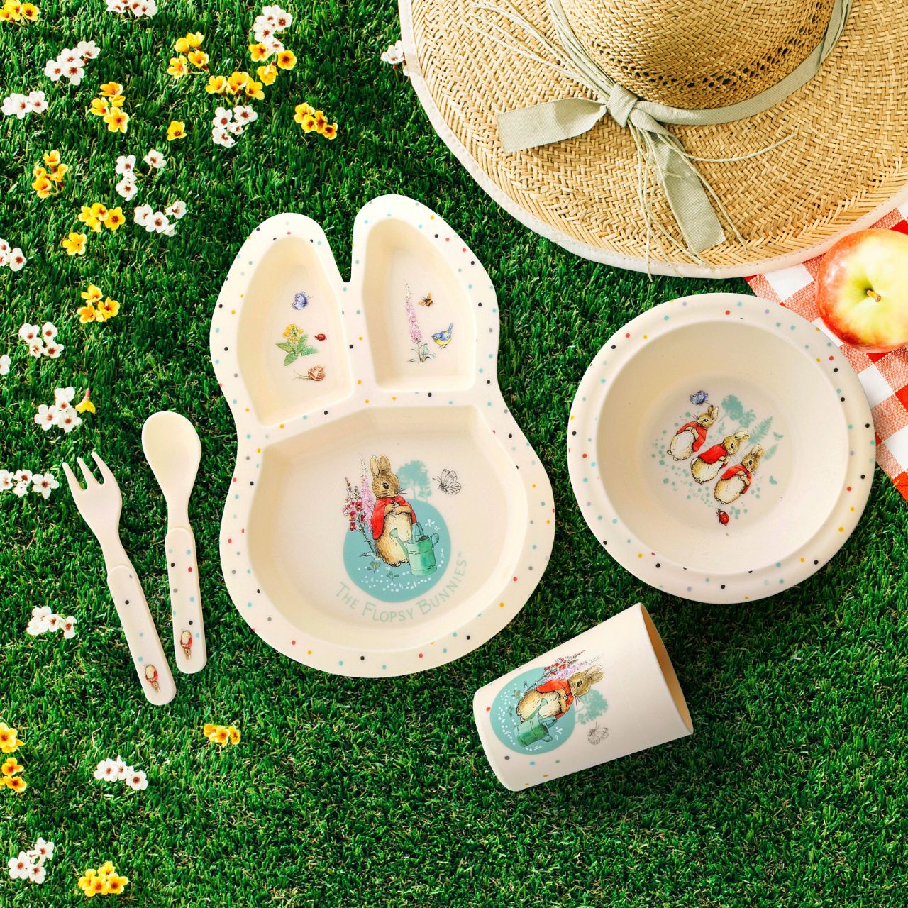Peter Rabbit Flopsy Dinner Set  Introducing this brand new at home with Peter Rabbit collection. There's nothing quite like a fun Flopsy motif to entice those little tummies to clear their plates. Make mealtimes fun and practical with this dinner set. This highly durable dinner set can be used at home, in the garden, or on the go.