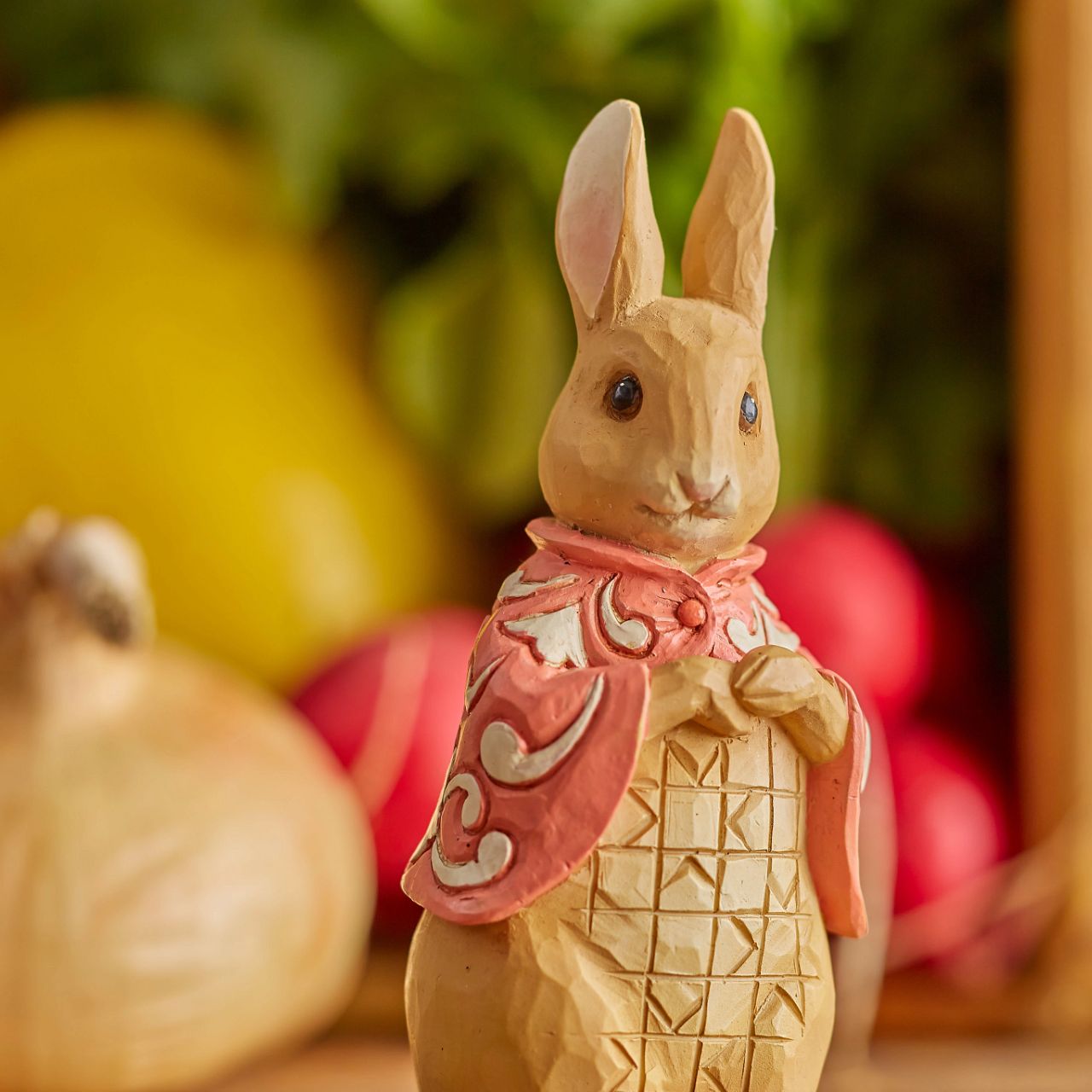 For nearly 120 years the story of Peter Rabbit has captivated audiences of all ages. Jim Shore elevates the beloved tale to even greater heights with this lovely line featuring Flopsy gardening.