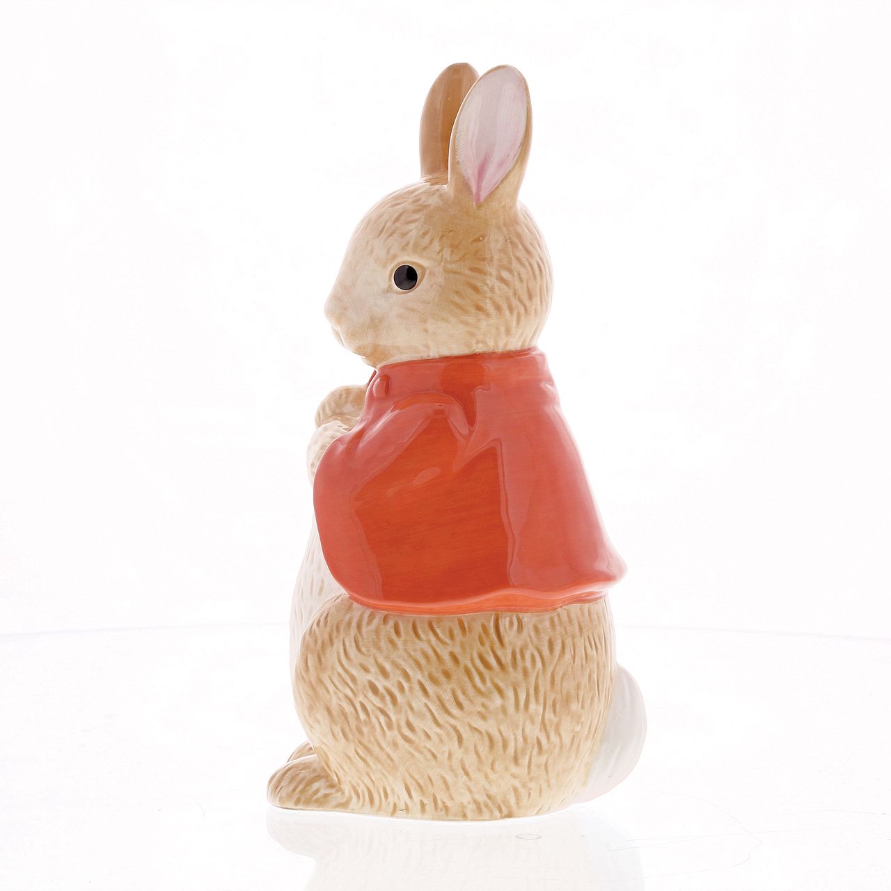 Beatrix Potter Flopsy Sculpted Money Bank  This delightful and charming Flopsy shaped money box would make an ideal christening gift, for collectors and Peter Rabbit fans, both young and old. The artwork is taken from the original illustrations from the Beatrix Potter stories.