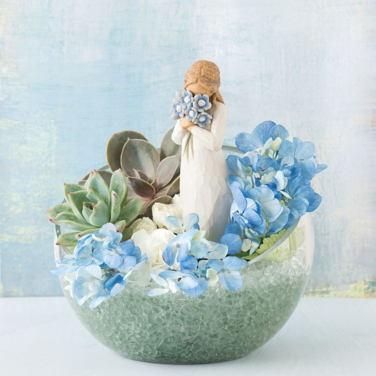 Forget-me-not by Willow Tree  A gift to express sympathy, comfort and healing ...an expression of love and caring... or for those who love flowers. Forget-me-not is a thinking of you piece, with a universal message. She represents timeless friendship and love that spans any distance.