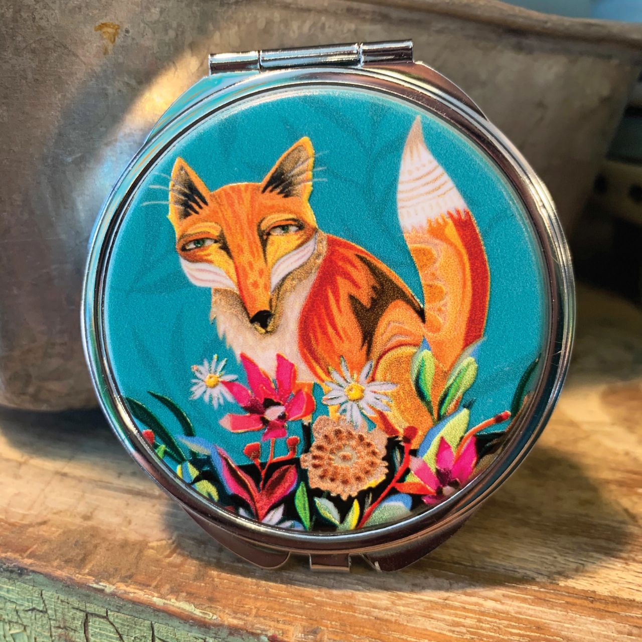Michelle Allen Fox and Flowers Trinket Box  This lightweight and durable Fox and Flowers Trinket Box trinket box makes a splendid gift for a friend or yourself. They are the perfect size to fit in any purse, make-up bag, carry on, or backpack. And best of all, they are super practical for every day use.
