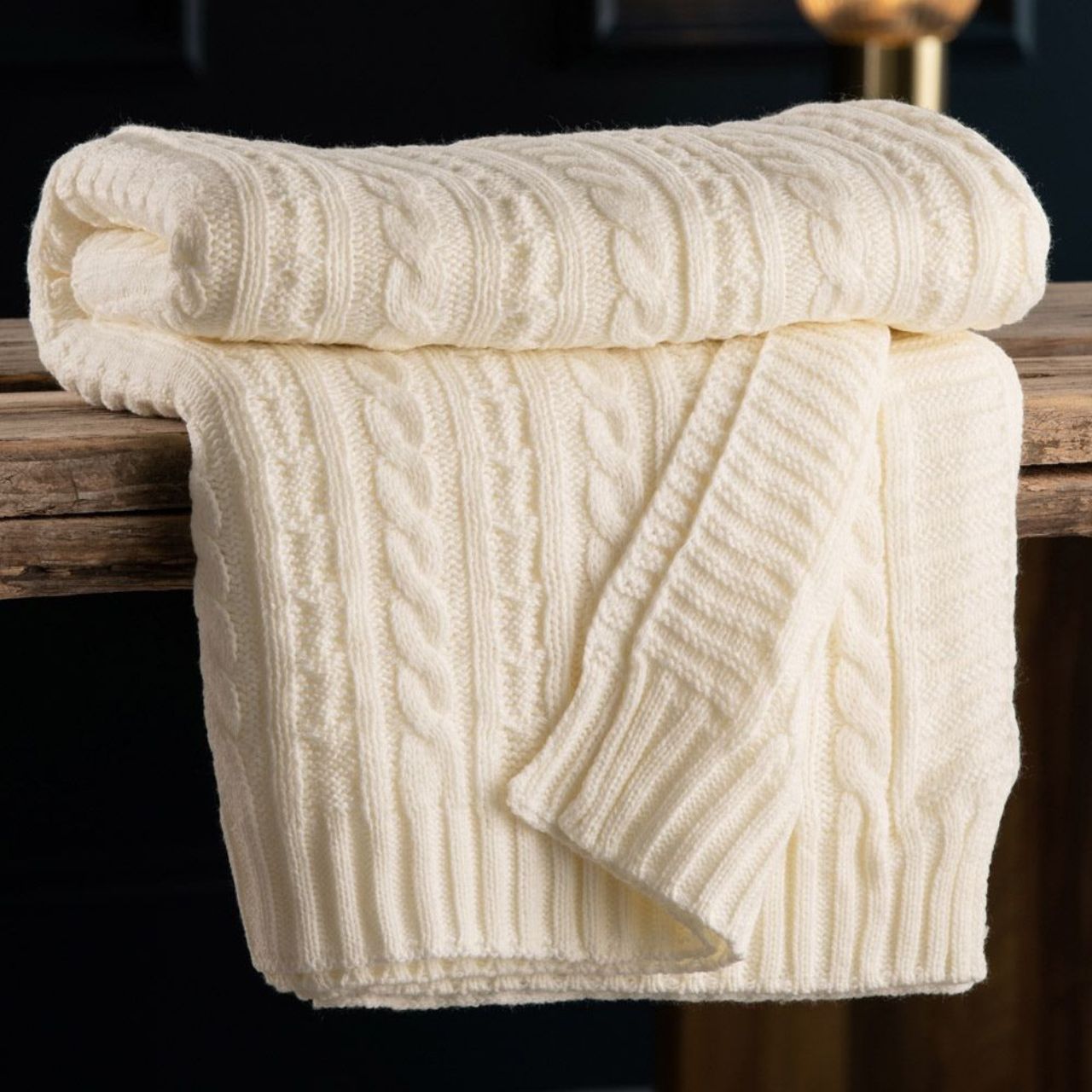 Our Aran Kit - Soft White Throw is every piece of luxury and warmth keeping you cosy all year round. This throw is a great addition to any bedroom or living space adding that perfect finishing touch.