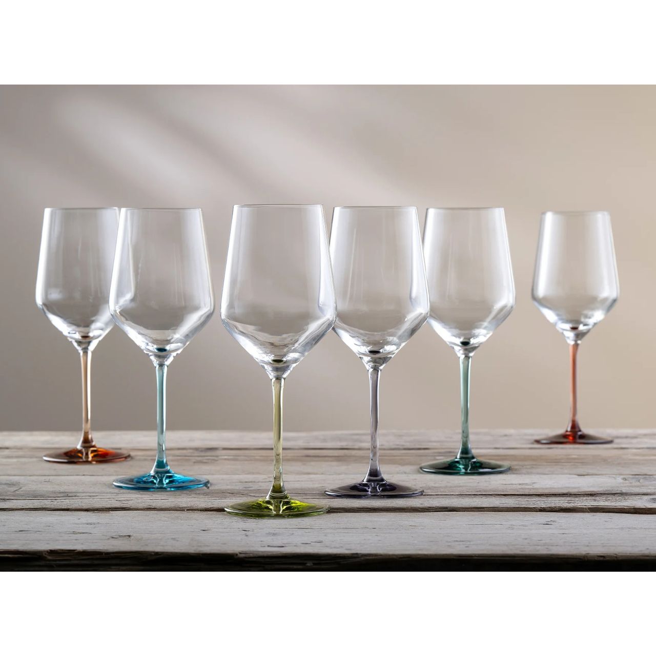 Add a splash of vibrant personality to your table with the Chroma Collection. Each set of six features a unique jewel-toned base, ensuring every guest has their own signature colour.