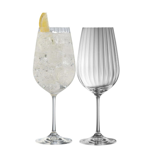 Our New Erne Spritz glass is crafted with precision and attention to detail, our Spritz Glass not only enhances the aesthetics of your drink but also its aroma and taste. The wide bowl design allows for better aeration, while the gently tapered rim directs the cocktail's delightful bouquet directly to your nose, providing a full sensory experience.