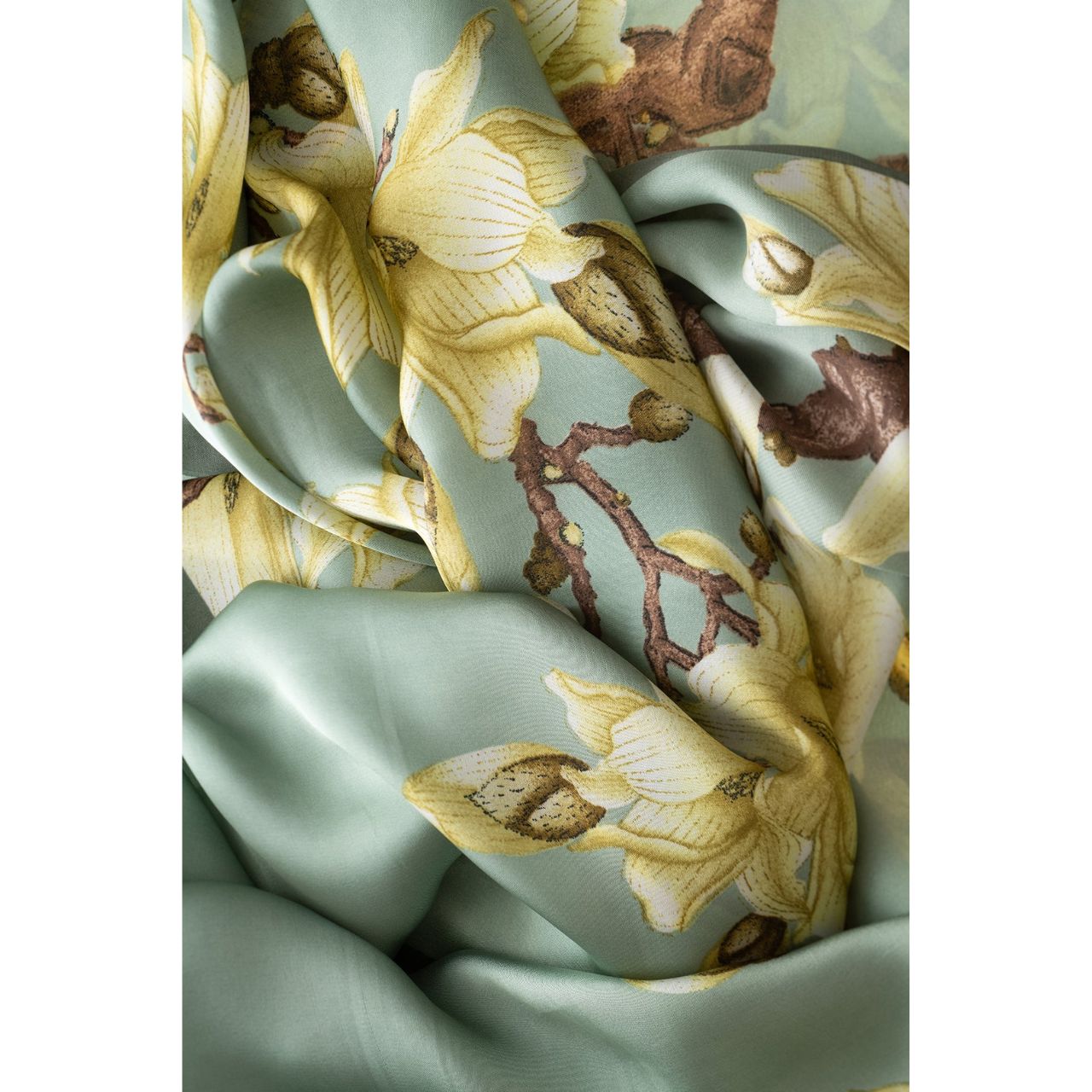 Sage & Apple Blossom Polyester Scarf  Our Sage & Apple Blossom Polyester Scarf is the perfect rich colour that will draw attention and complement any outfit. This rich, soft and comfortable scarf is a must have and also comes in a beautiful box ready for gifting. A touch of luxury for everyday life and perfect for all seasons.
