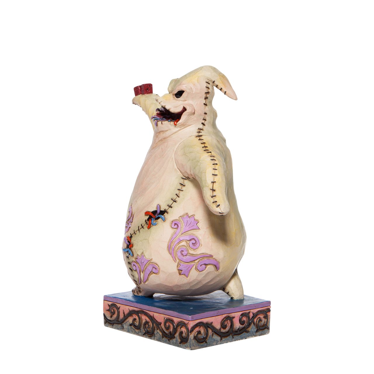 Oogie Boogie the main antagonist of Tim Burton's The Nightmare Before Christmas, strikes a sinister pose in this Jim Shore statuette. Resembling a burlap sack filled with bugs, the villain is profusely power hungry and diabolically negligent.