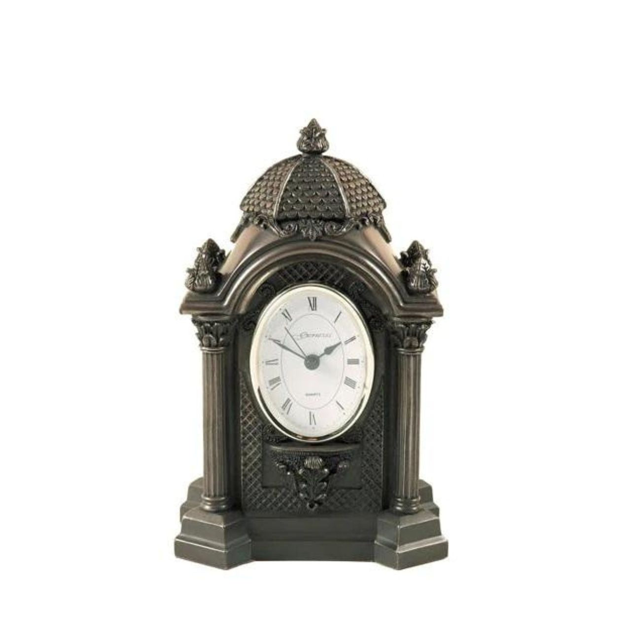Genesis Oval Clock  This small mantle clock looks great as a center piece with its beautiful delicate detailing on front and back. Suitable gift for any occasion.