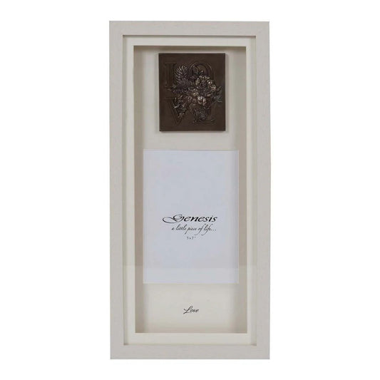 A gorgeous faux blond wood frame, showcasing the word "Love", encased in a beautiful flower display, in cast bronze with a space for a 5 x 7'' photo and the inscription, "Love" at the bottom of the frame.